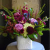Each arrangement is custom designed, using seasonal, best-of-day blooms. The image shown