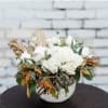 Stunning mix of harvest textures and ivory blooms eloquently designed in a