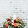 Wow your guests this season with this traditional yet one-of-a-kind floral centerpiece