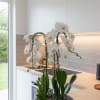 A high quality Triple white orchids arrangement with a vase 12.5&quot; D