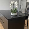 A high quality Four white orchids arrangement with a vase 12.5&quot; D