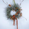 This long lasting wreath brings in the season with natural dried elements.