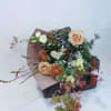 This assortment of seasonally sourced blooms is ready for your vase. Hand
