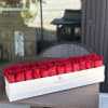 Elegant long signature box filled with around 30 fresh red roses.
The color