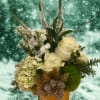 Gold patterned ceramic container filled with the freshest flowers for the holiday