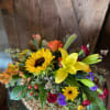 Assortment of Fall Blooms Perfect for Any Table. **Flowers may vary