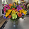 Celebrate the joy of color with our Sunburst Garden Bouquet, a cheerful