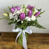 Elegant Purple &amp; White Tulip Vase

This graceful arrangement showcases a stunning mix
