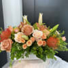Discover the pure beauty of our White Canvas Arrangement, where a sleek