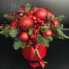 Red Christmas. Red berries, red balls and green spruce branches. They create