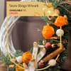 This delightful Christmas wreath exudes warmth and festive cheer, crafted with love