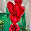12 red roses, 4 red helium balloons