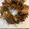 A beautiful 16&quot; wreath with dried and preserved leaves and assorted pods