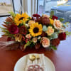 Flowers in a tray is a beautiful and convenient way to showcase