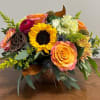 This vibrant centerpiece will bring the beauty of fall to any gathering!