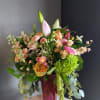 A beautifully selected bunch of the freshest flowers in a vase uniquely
