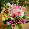 So pretty, this lush little arrangement, presented in a clear glass vase