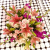 So pretty, this lush little arrangement, presented in a clear glass vase