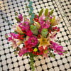 So pretty, this lush little arrangement, presented in a clear glass vase