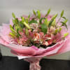 A romantic celebration of soft pink beauty, this luxurious bouquet blends fragrant