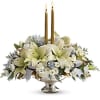 Celebrate the season with this majestic centerpiece. This stunning arrangement includes white
