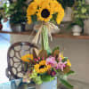 Flowers: 12 sunflowers wrapped together and base flowers such as green hydrangeas