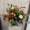 This Thanksgiving, gather around this wildly vibrant, fall centerpiece that includes fresh