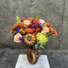 Fall inspired blooms with daisy poms, chrysanthemums, roses, blooming fillers, with decorative