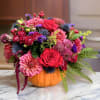 Celebrate the beauty of the fall season with our stunning autumn floral