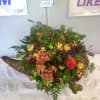 Cornucopia with Orange roses, Bronce, Orange, and yellow moms Chrysanthemums, Eucalyptus, Bupleurum