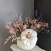 Beautiful white ceramic, keep sake, pumpkin with lid. Filled with dried flowers.
