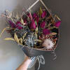 A spooky mix of dried roses, protea and fall foliage. Perfect for