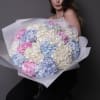 A stunning bouquet of fresh hydrangea in light pink, blue and white