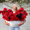 A masterpiece of contrast &mdash; bold red and mysterious black roses. Elegant.