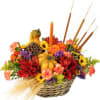 Fall table top basket/ centerpiece. This bouquet is designed with fall florals