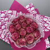 enchanting Pink roses, beautifully arranged and wrapped in luxurious Pink Dior-inspired paper.