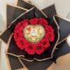 Bouquet with red roses around a heart - shaped box of chocolates