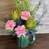 Fun cactus inspired mug filled with beautiful blooms. 