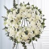 Honor your loved one with our Serene White Floral Wreath, a beautifully