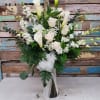 This beautiful all white arrangement is the perfect way to send your
