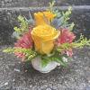 This arrangement has roses, chrysanthemums, solidago, thistle and greenery. 