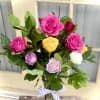 Send one dozen assorted mix short stem rose bouquet. Delivered with seasonal
