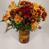 This beautiful Fall arrangement has Burgundy Carns, Orange Alstro, Red Hypericum Berries