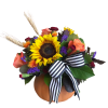 Ceramic pumpkin filled with sunflowers, roses, pixie carnations and wheat tufts