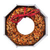 This 100% seed wreath will feed the birds while keeping the squirrels