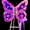 This custom Butterfly tribute includes a variety of Carnations and Mums in