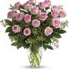 This exquisite flower arrangement showcases the timeless beauty of 12 long stem