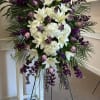The Funeral Spray Standing White is a serene and elegant tribute, combining
