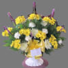 A beautiful deluxe basket filled with a variety of fresh summer flowers