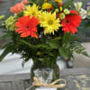 Deal of The Day-Sunshine Bouquet with Ralphina&#039;s Homemade fudge
Orange Gerberas, yellow daisys